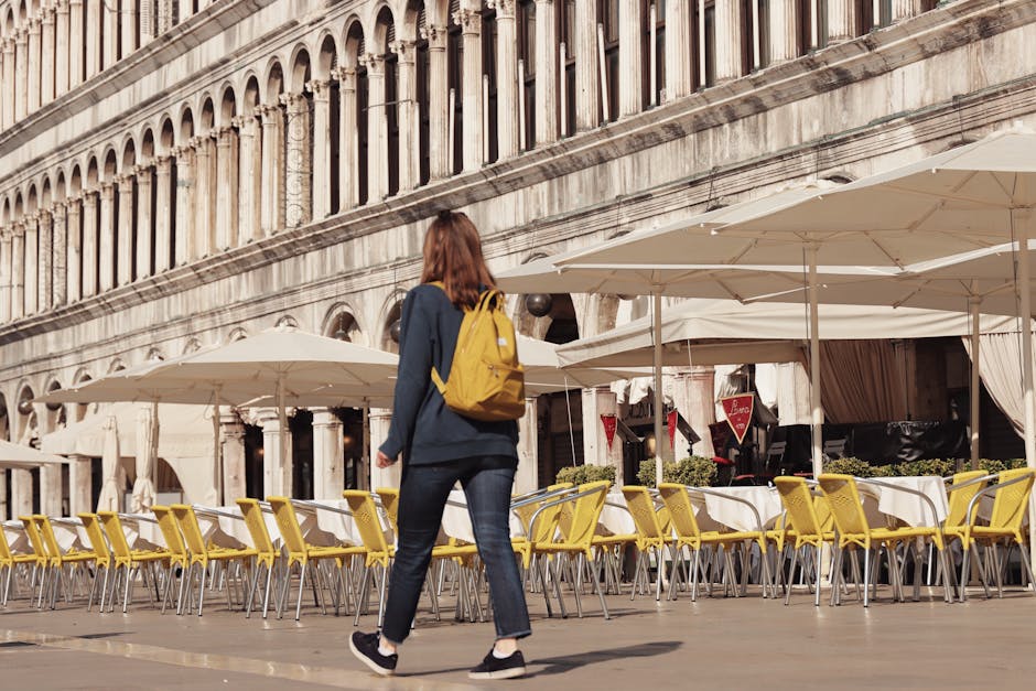 Backpacker in city square