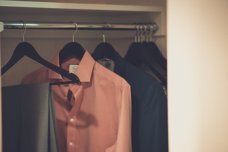 clothing hanging neatly in closet