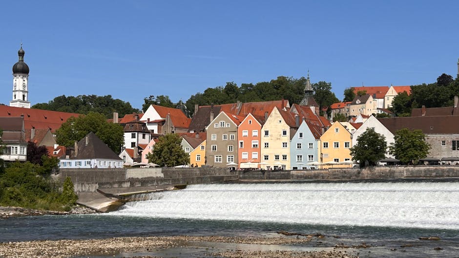 colorful houses by river in old town
