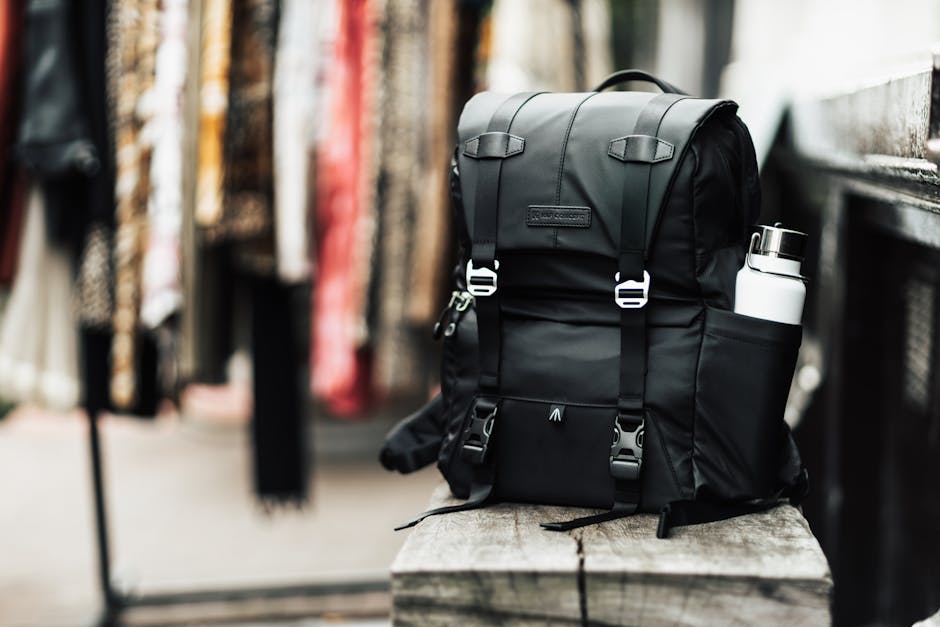 compact travel backpack on a bench