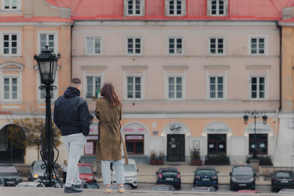 couple walking in a trendy Polish city street