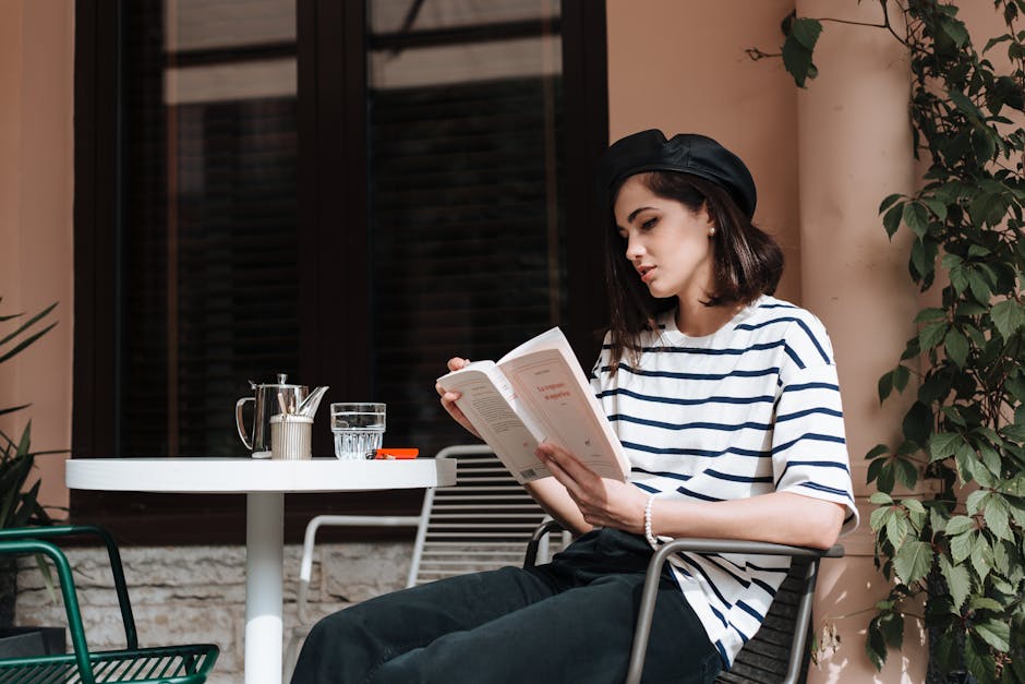 french woman in minimalist outfit cafe