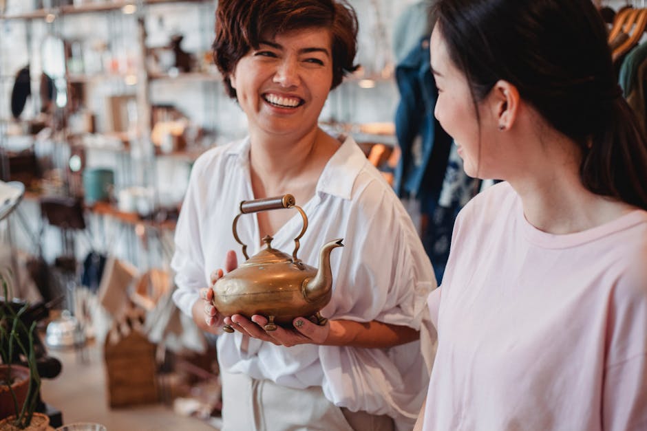 friends laughing while  in vintage store