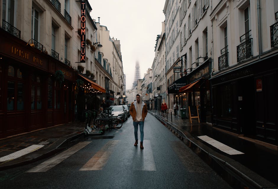 man with scarf winter eiffel tower