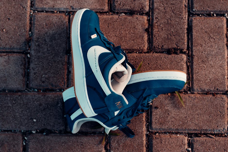 street style sneakers close up on pavement
