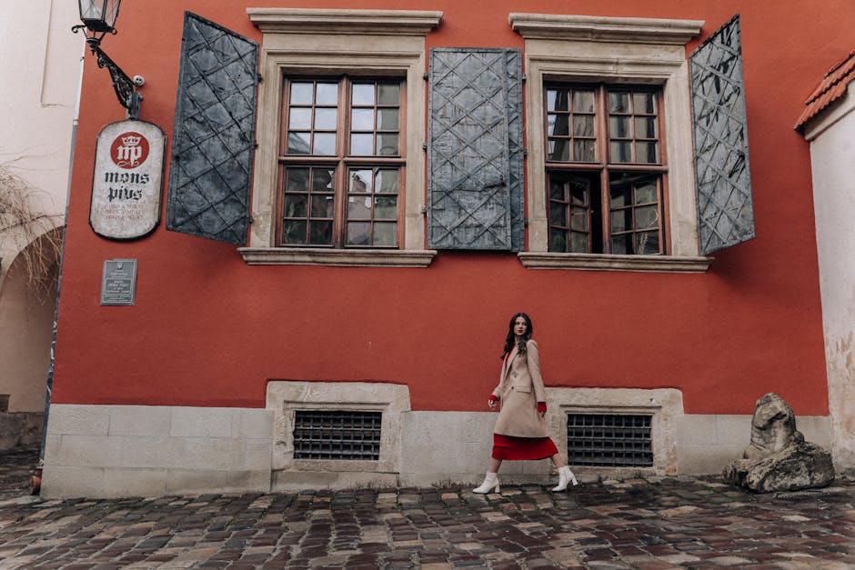 stylish woman walking in old town