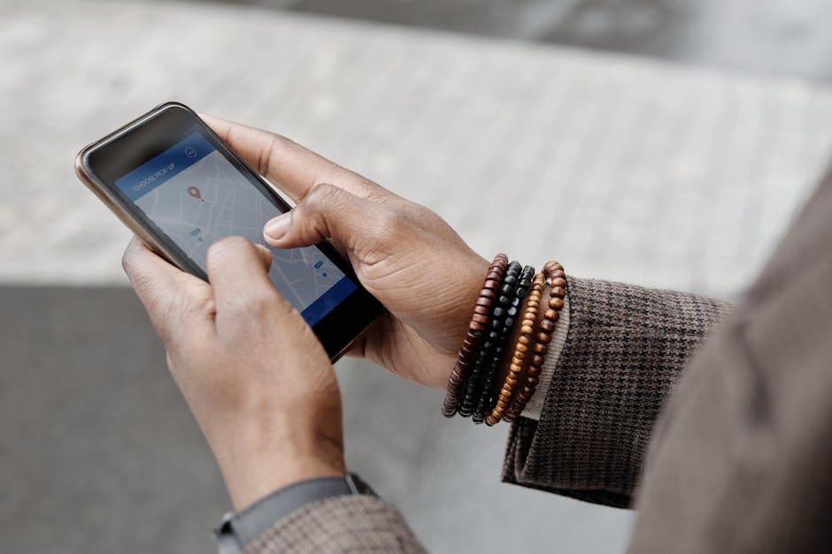 traveler using map on phone in city