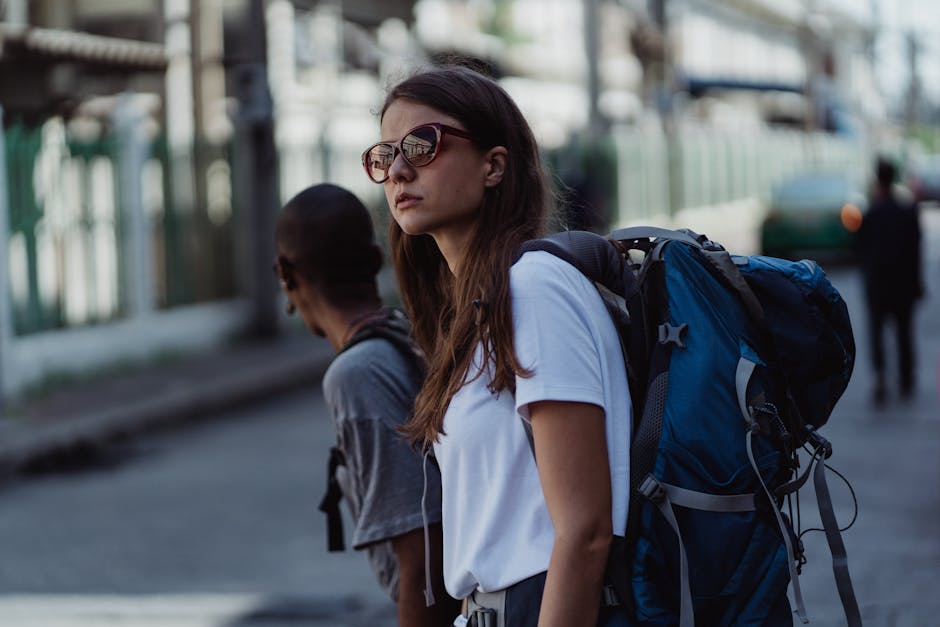 traveler with backpack in city