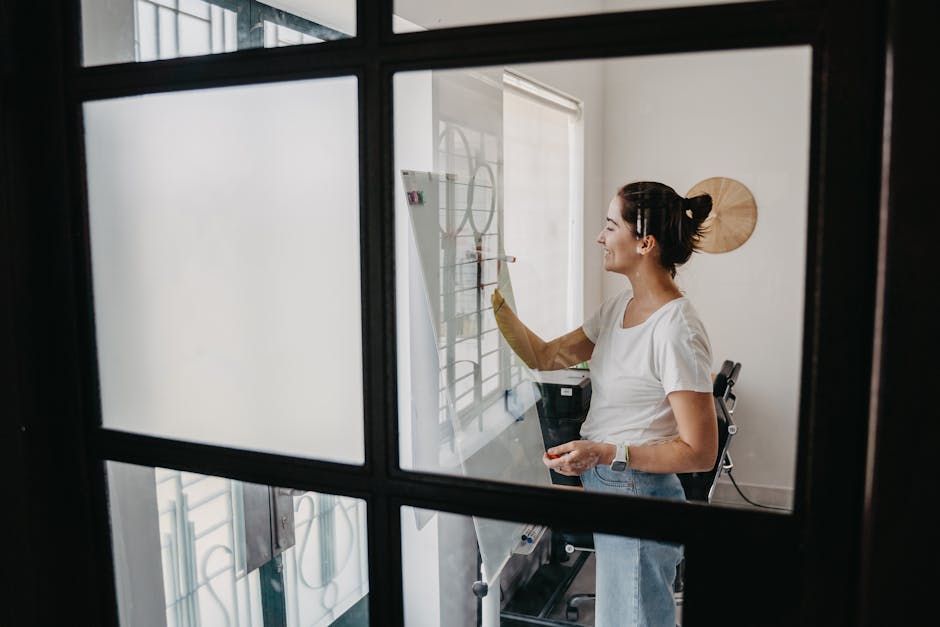 woman brainstorming ideas on whiteboard