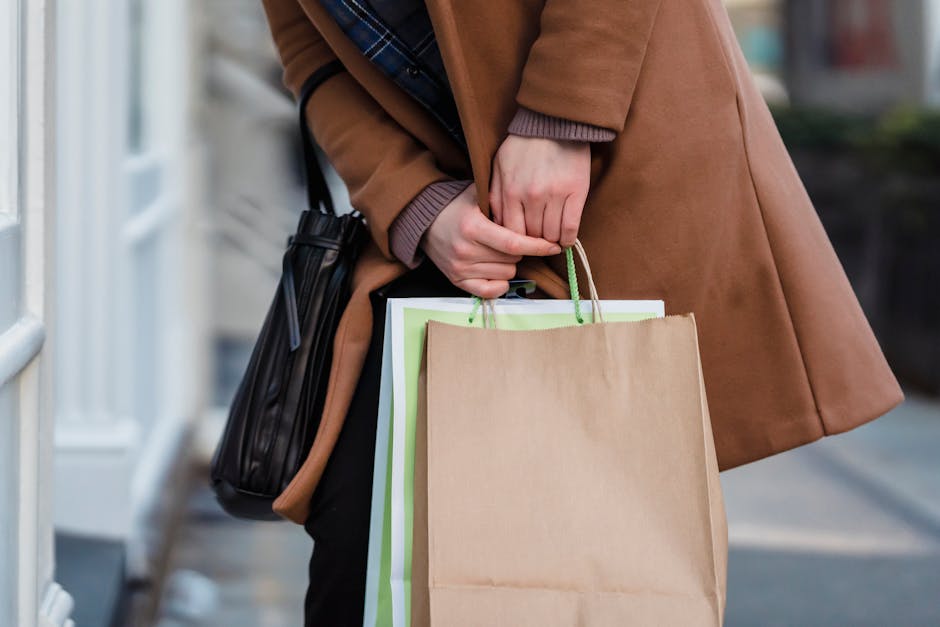 woman holding  bags in a city