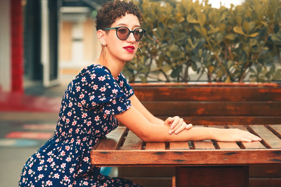 woman in floral dress summer cafe