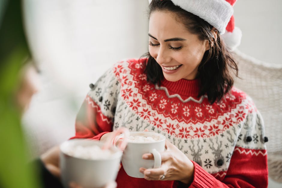 woman laughing in cozy winter sweater