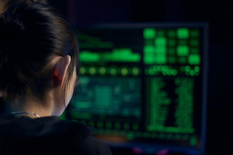 woman looking at computer screen