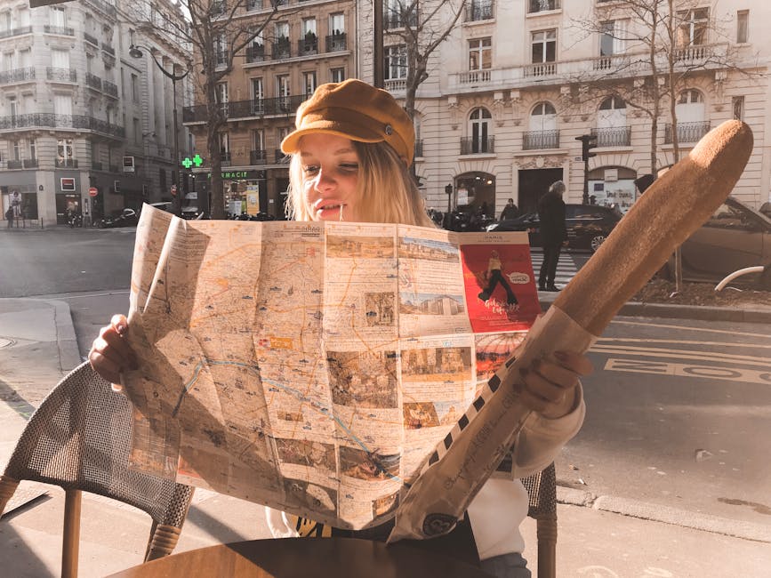 woman looking at map in french city