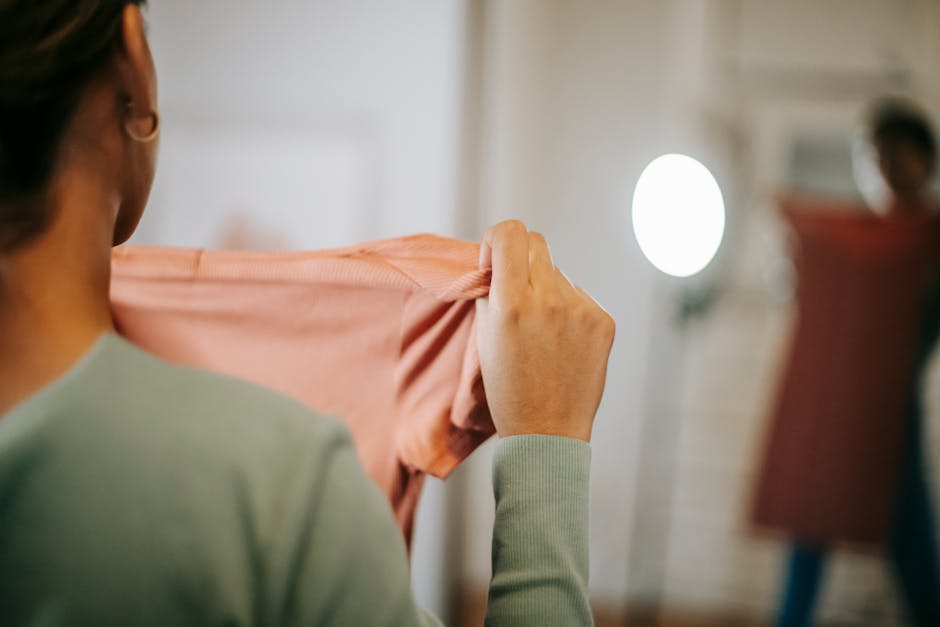 woman trying on second hand clothes