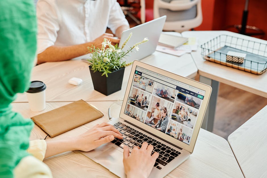 Woman using AI software on laptop, coffee, modern office
