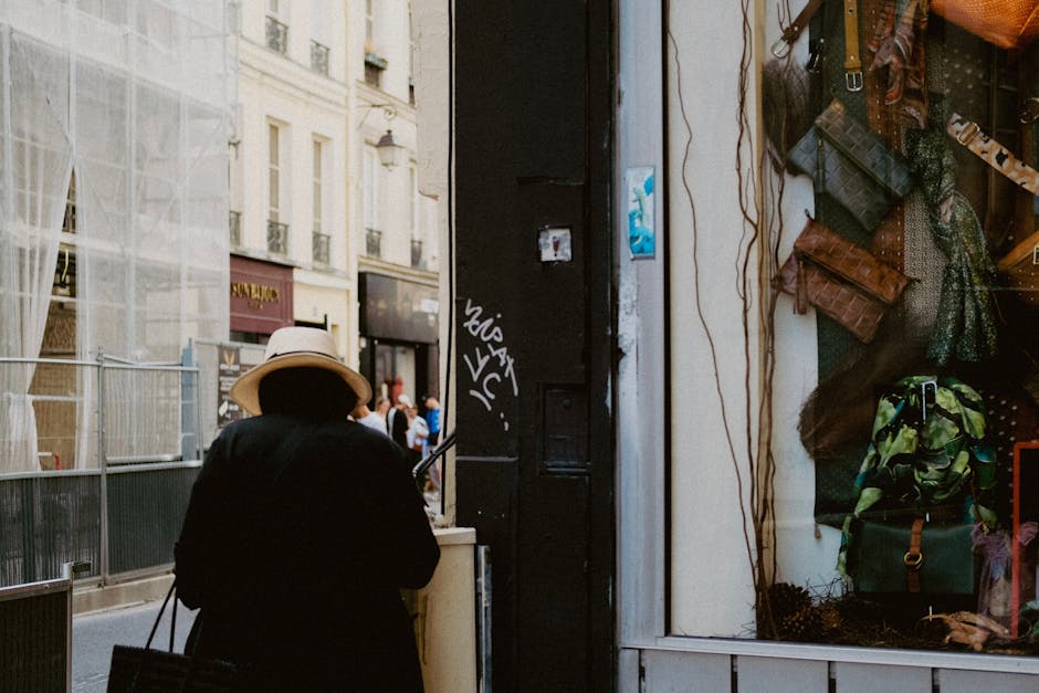 woman walking in paris street with elegant bag