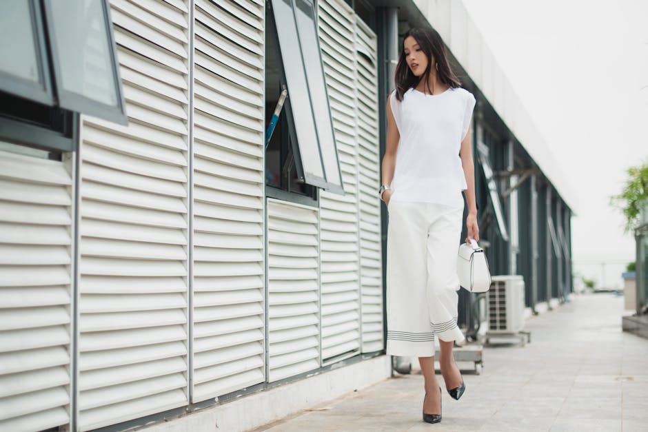woman walking in stylish minimalistic outfit
