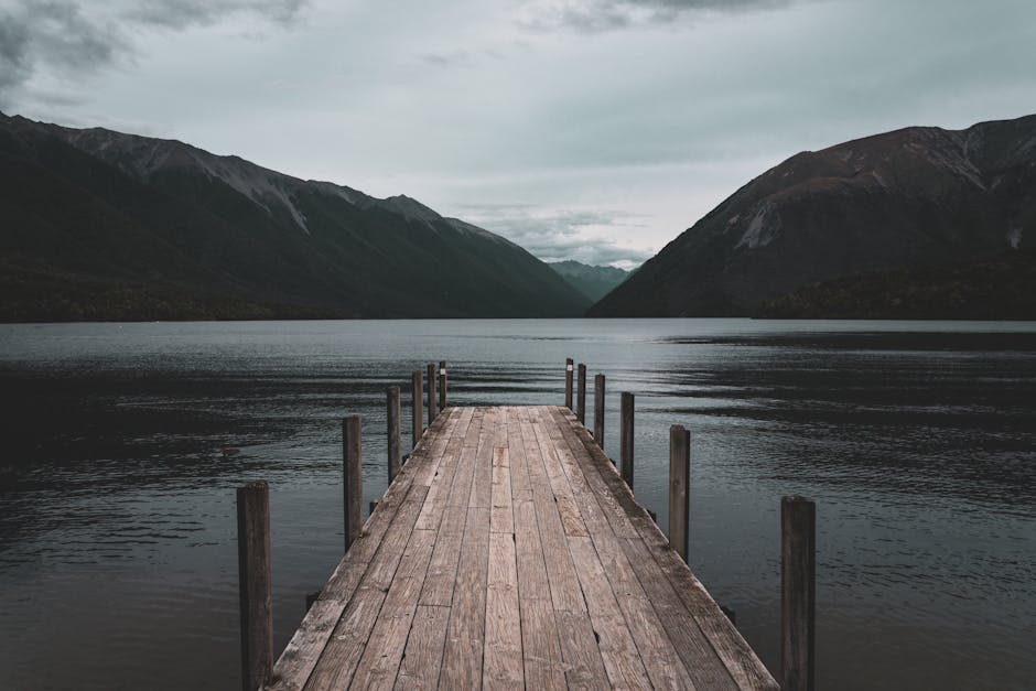 wooden pier leading into sea