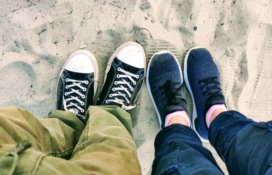 A curated selection of various comfortable walking and travel sneakers, illustrating diverse options for different foot types and preferences.