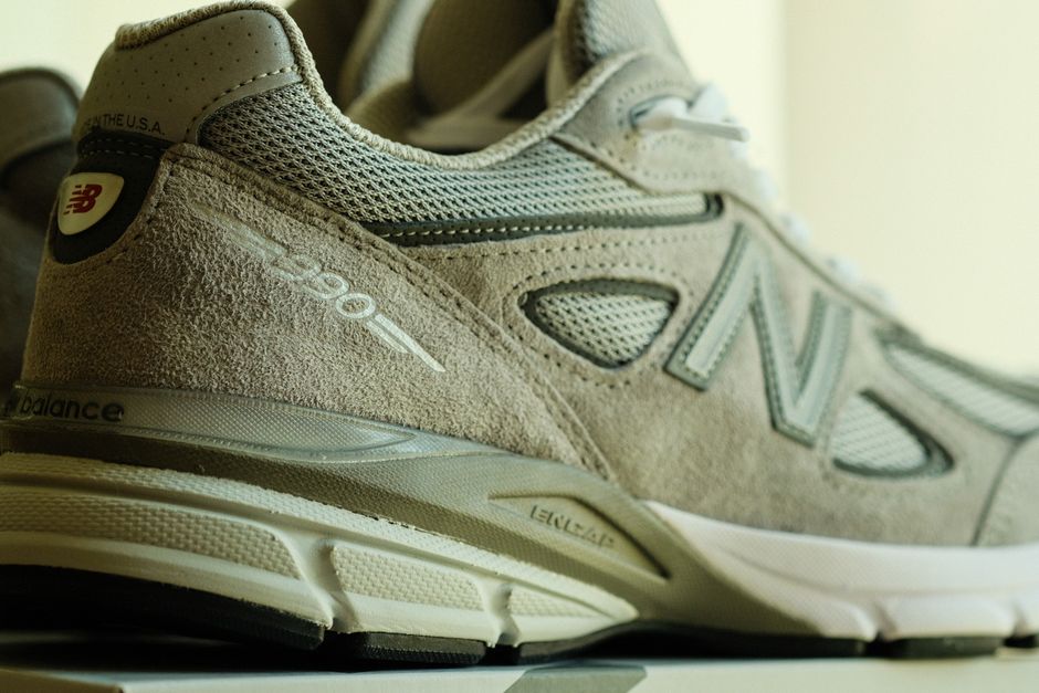A detailed view of a sandal's interior, showcasing its contoured footbed, prominent arch support, and cushioning layers designed for extended walking.