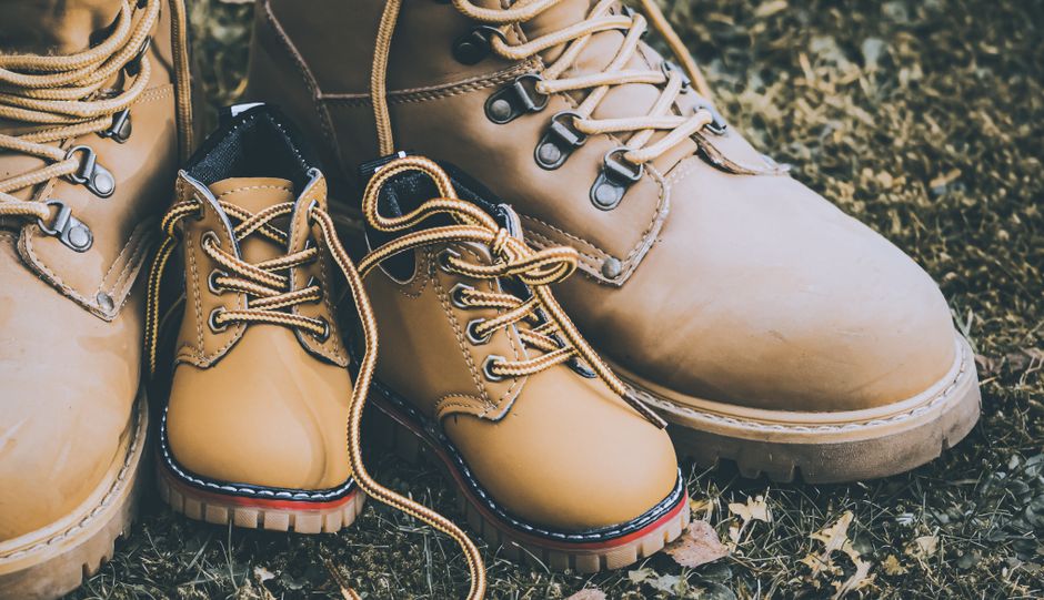 A visual comparison grid displaying US, UK, and EU shoe sizing charts, highlighting different measurement systems for men and women.