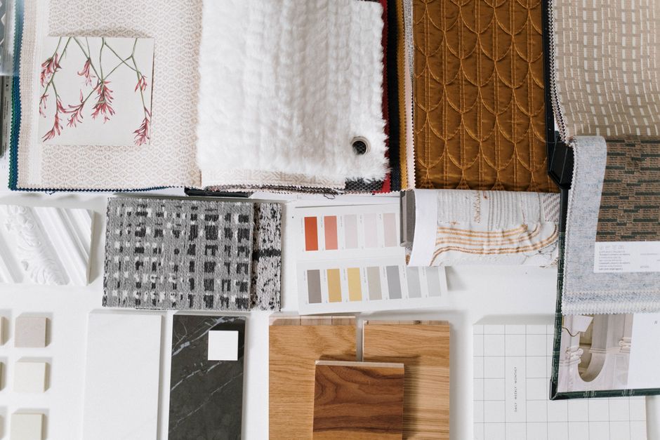 A close-up of various sustainable fabric swatches including organic cotton, linen, and hemp, highlighting textured and natural materials.