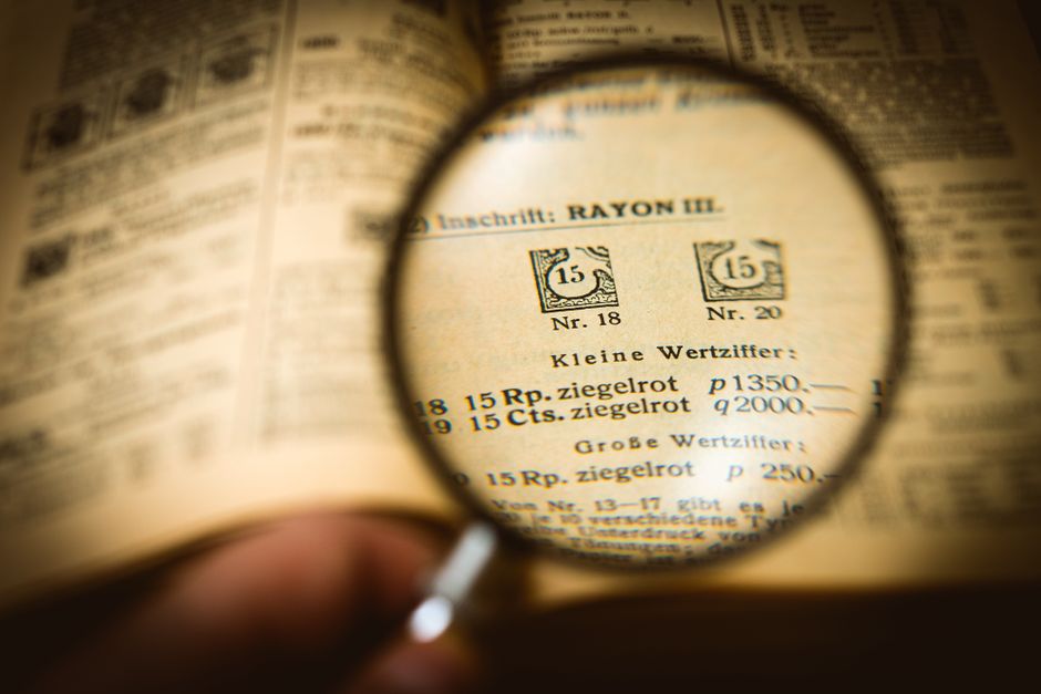 A magnifying glass hovering over the small print of an online beauty offer, emphasizing the need to read terms carefully.