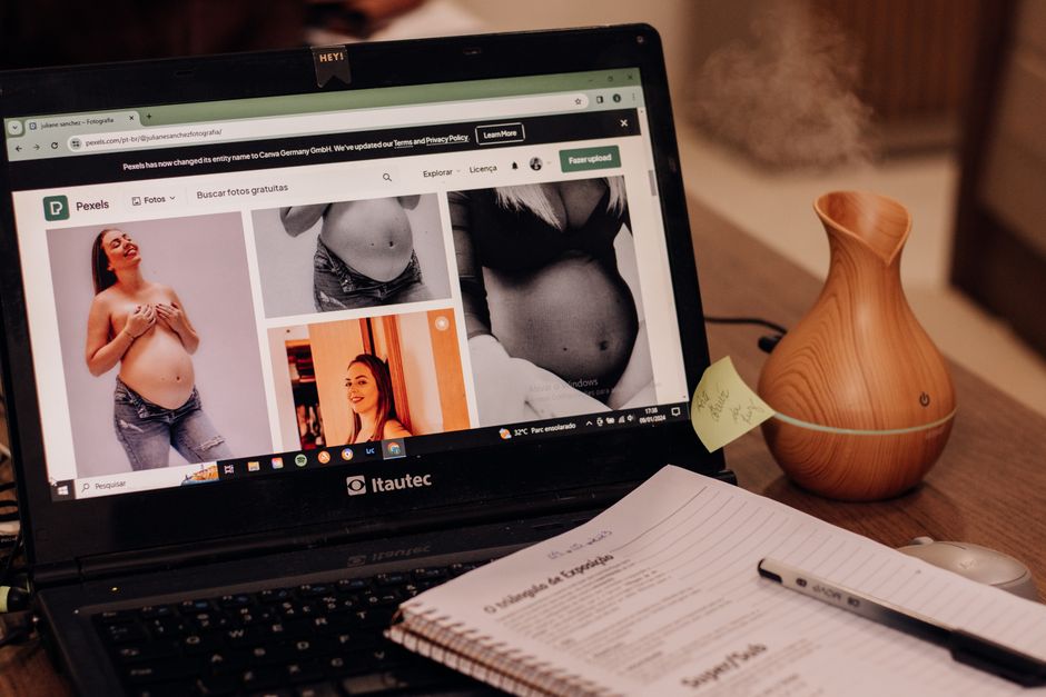 A person's hands are on a laptop keyboard, with multiple browser tabs open showing different online store websites and price comparison charts, symbolizing careful deal analysis.