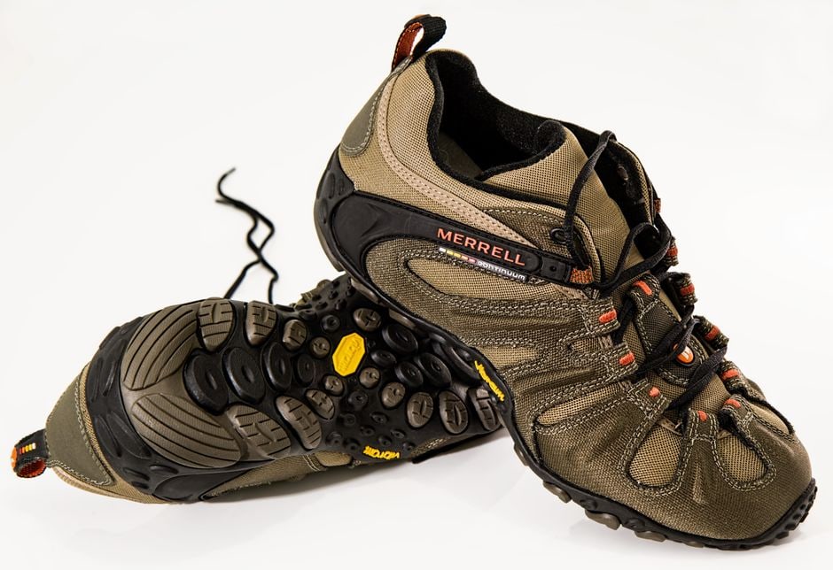Detailed view of the interior of a supportive shoe, highlighting the arch support and cushioned insole.