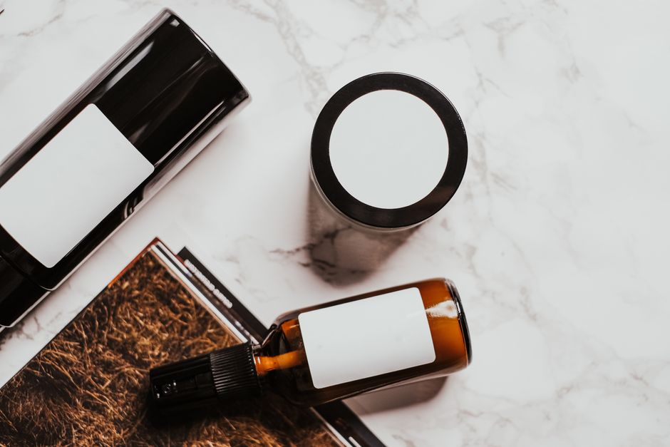 A collection of simple, effective skincare products like cleansers, moisturizers, and SPF bottles on a clean background.