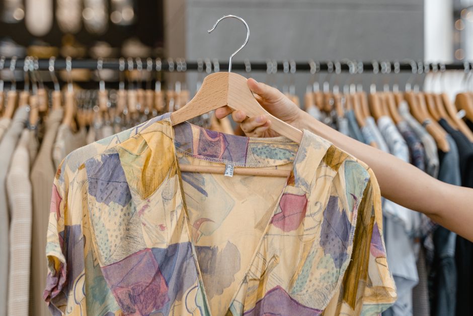 Close-up of various sustainable fabrics like linen, organic cotton, and Tencel, draped neatly.