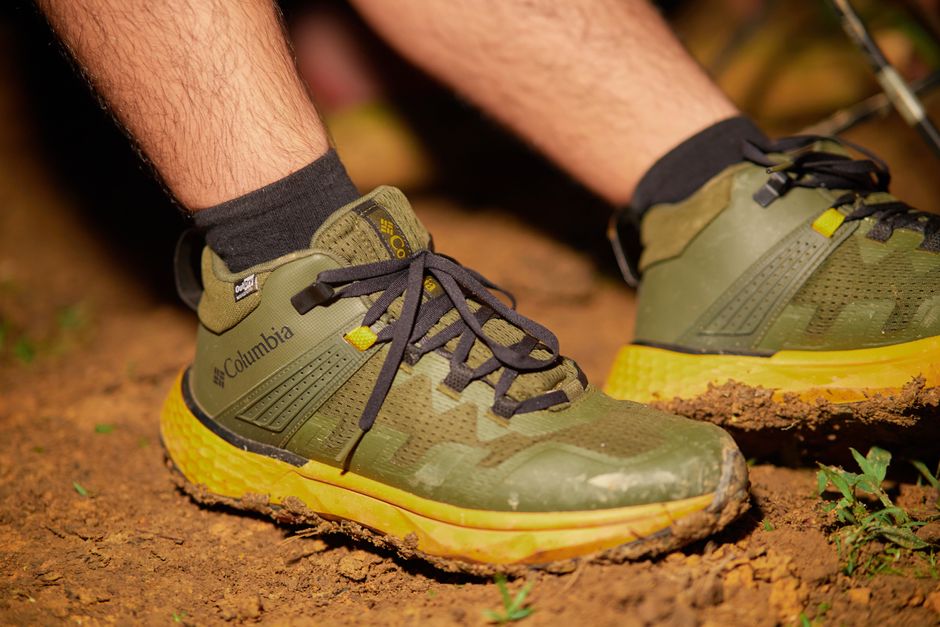 Close-up detail of various waterproof shoe materials like leather, synthetic, and mesh.